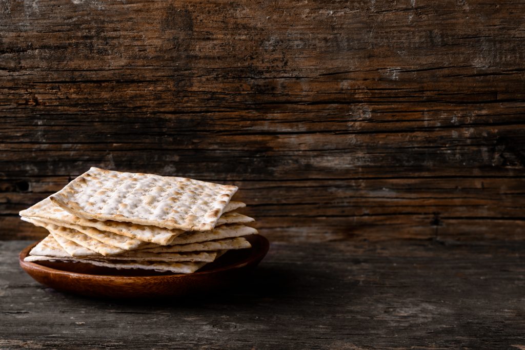 matzah bread with a wooden back drop