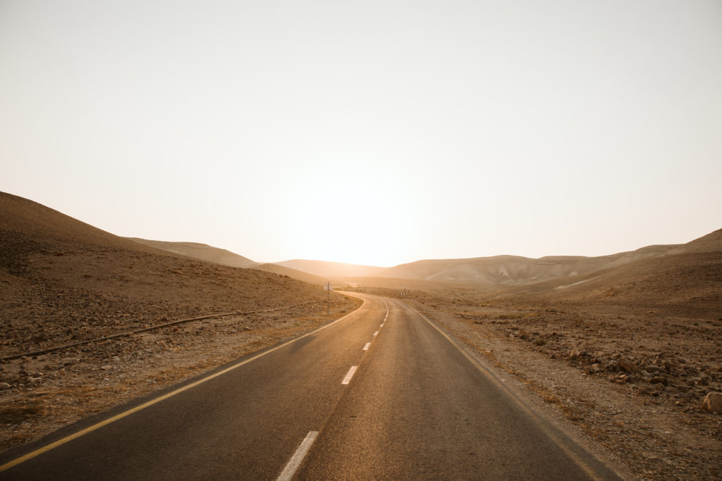 a road at sunset in the negev